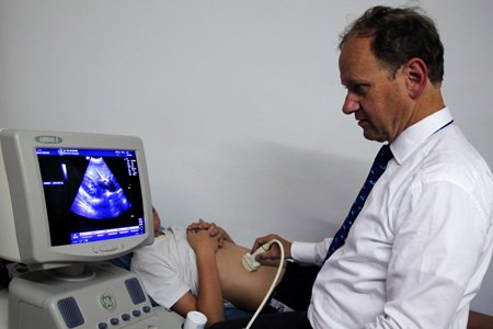 Dokter Heymans doing an Echography / Ultrasound